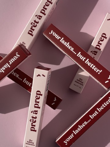 pink and purple boxes of mascara tumbling